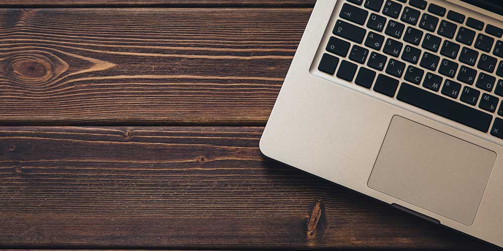 Laptop on wood table